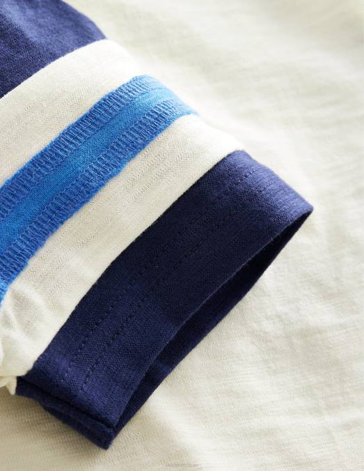 Boden vêtements ivoire/marine universitaire bébé t-shirt sportif à manches courtes LB2X3320