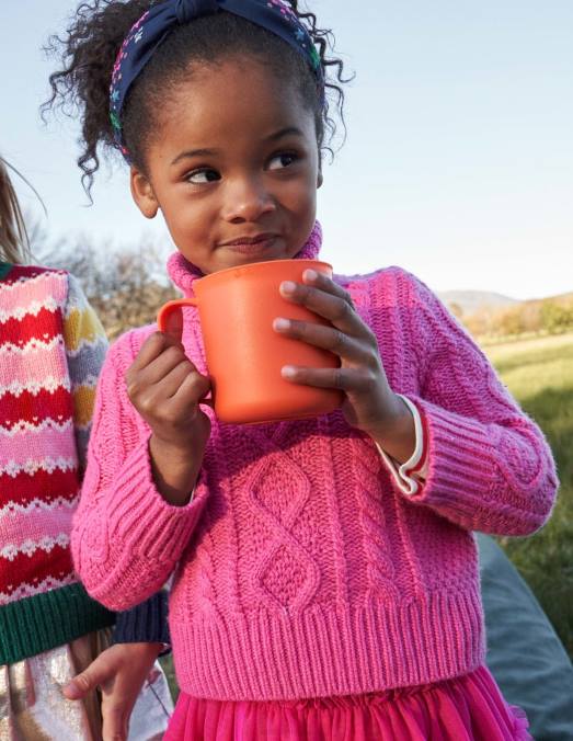 Boden vêtements câble rose choquant filles pull à grosses torsades à col roulé LB2X3145